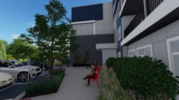 Sitting area along an exterior walkway at Marketview Apartments in Ithaca, NY